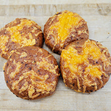 Load image into Gallery viewer, four round buns topped with cheese and bacon
