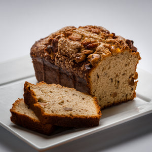 Slices of banana nut bread on a white plate